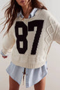 87 Graphic Sweater